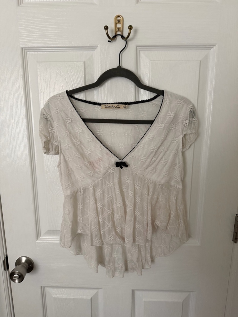 Liberty Love Ivory Lace V-Neck Peplum Blouse with Black Trim